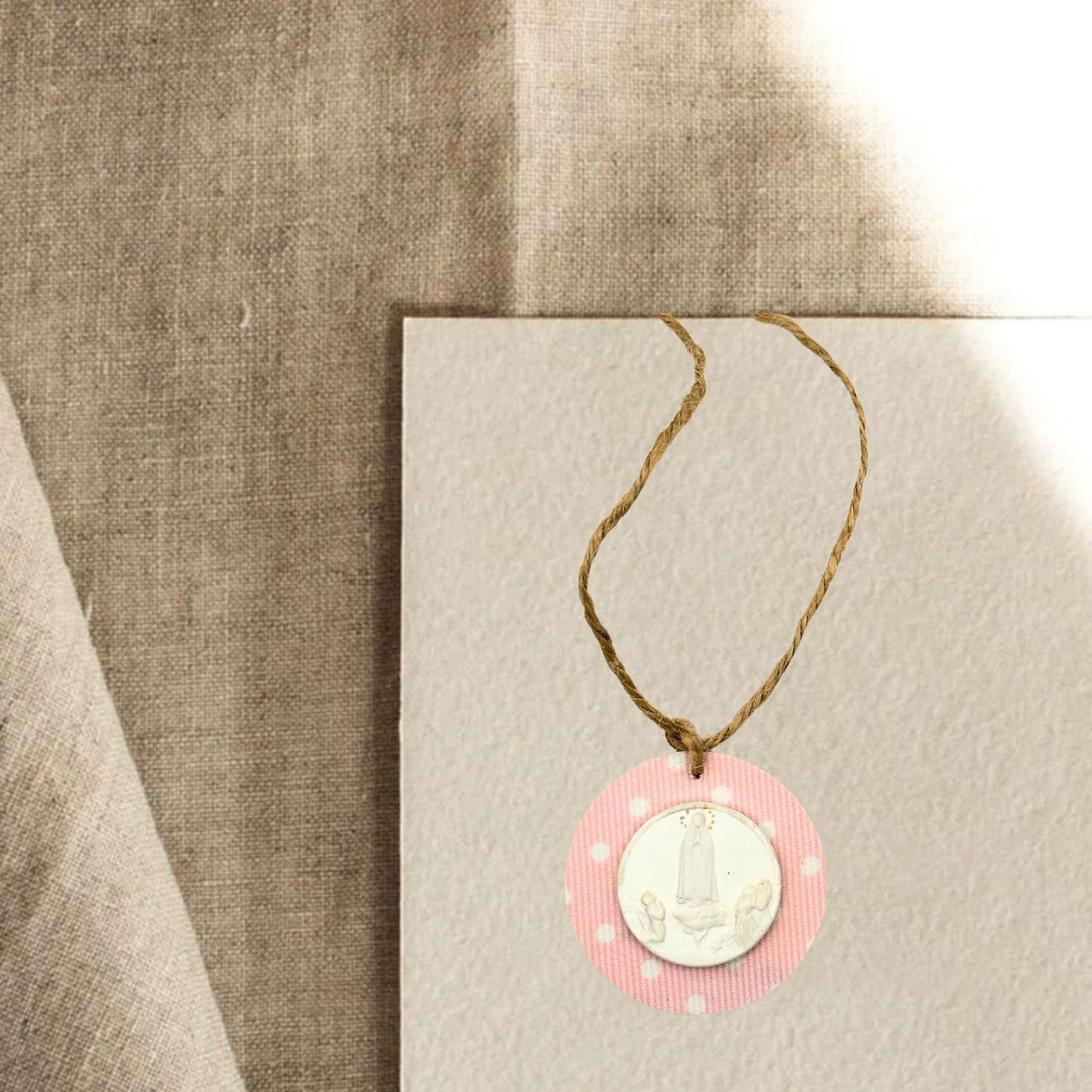Mini medallion of the Virgin of Fatima with pink polka dots