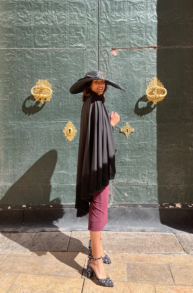 Luci cape with fringes