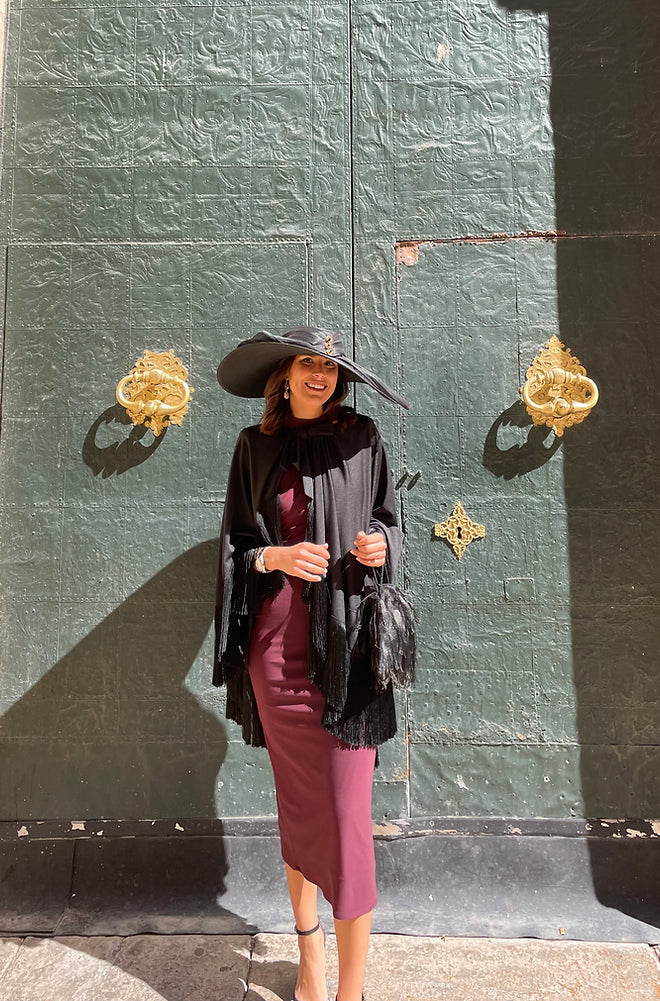 Luci cape with fringes