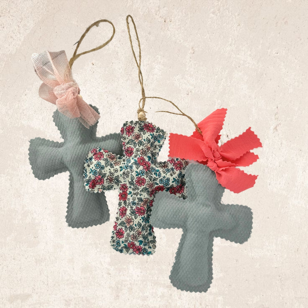Aqua green cross + coral bow