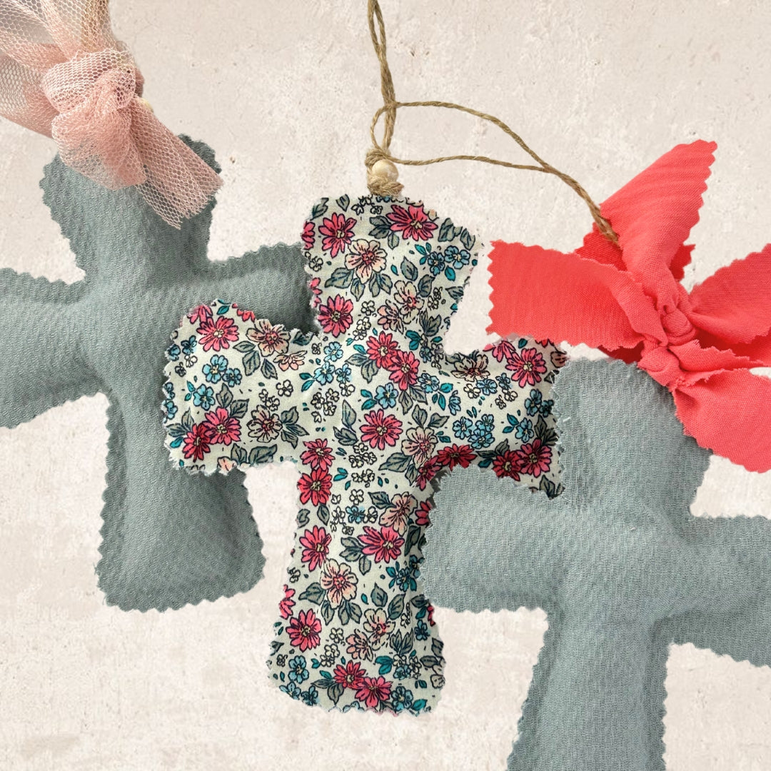 Aqua green cross + coral bow