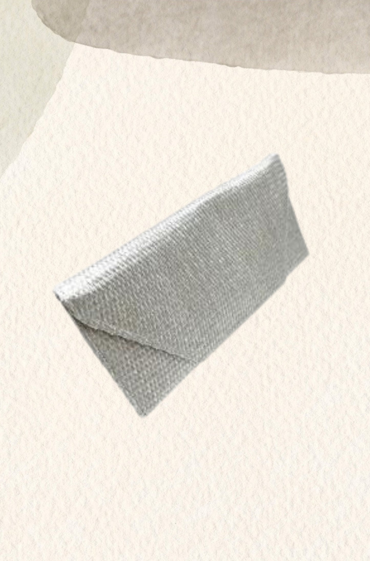 On silver raffia
